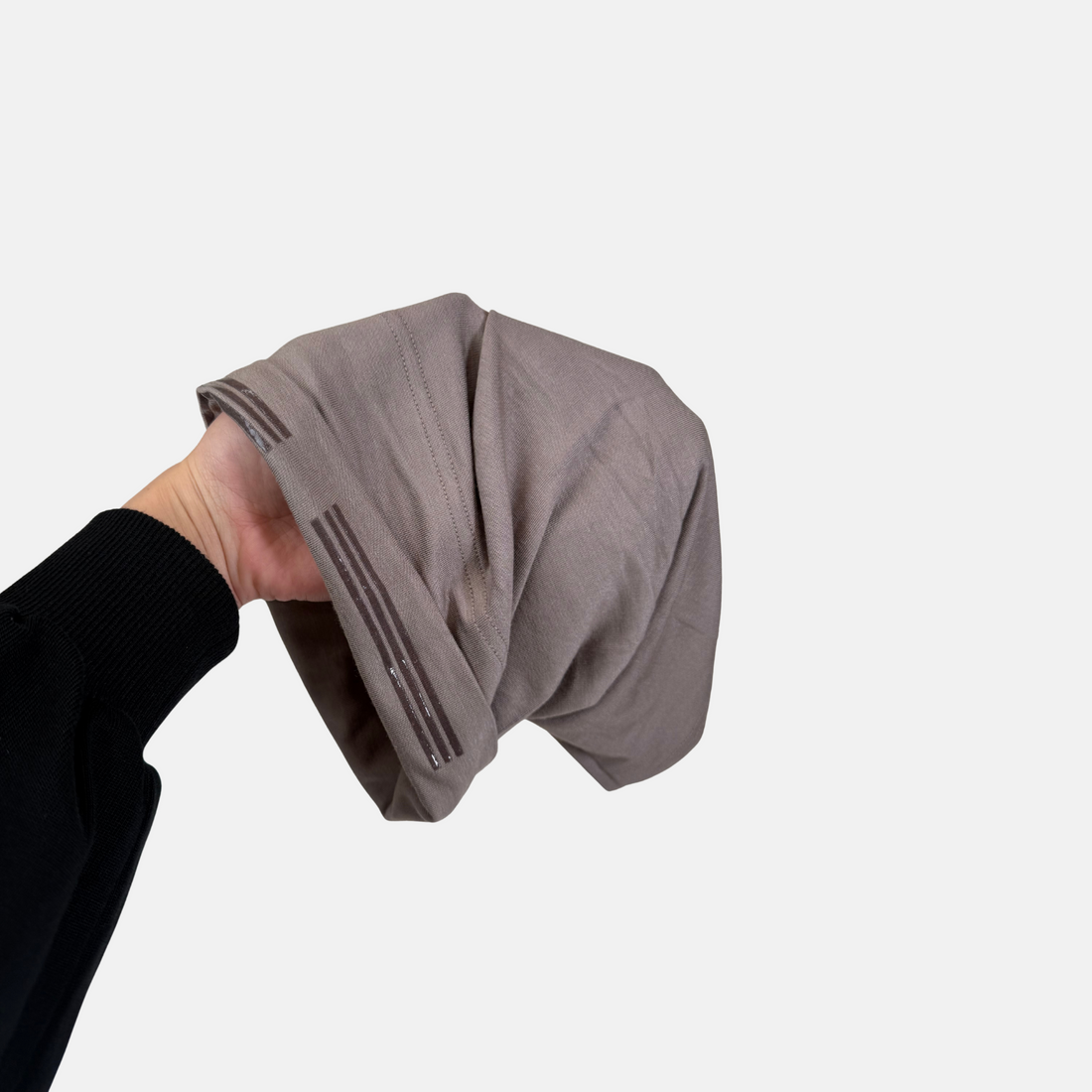 Mushroom grip under cap